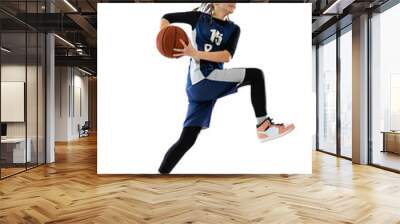 Throwing ball in a jump. Portrait of teen girl in blue uniform training, playing basketball isolated over white background. Wall mural