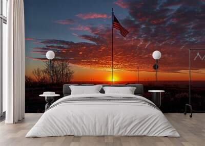 A powerful visual of the USA flag at half-mast during a sunset, serving as a somber and respectful tribute for national commemoration days. Wall mural