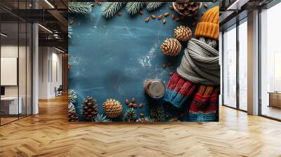 A well-arranged spread of winter travel essentials including a warm hat, gloves, scarf, thermos, and hand warmers, with a blank space in the center for text, styled with a clean and organized look, hd Wall mural