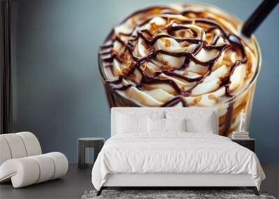 A close-up of a delicious iced coffee with whipped cream and chocolate drizzle. Wall mural