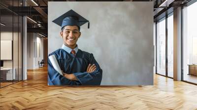 Male student smiling happily celebrating graduation. plain background Wall mural