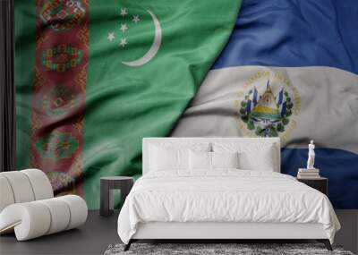 big waving national colorful flag of el salvador and national flag of turkmenistan. Wall mural