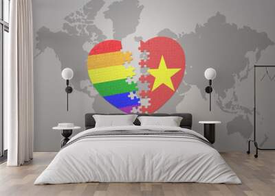 puzzle heart with the rainbow gay flag and vietnam on a world map background. Concept. Wall mural