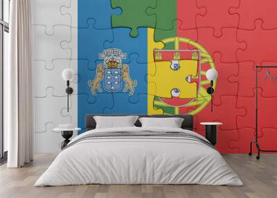 puzzle with the colourful national flag of portugal and flag of canary islands. Wall mural