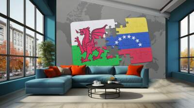 puzzle with the national flag of wales and venezuela on a world map Wall mural