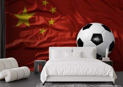 vintage football ball on the waveing national flag of china background. 3D illustration Wall mural