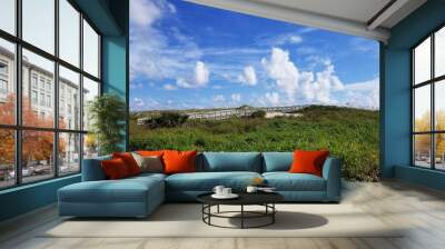 sandy beach with clouds Wall mural