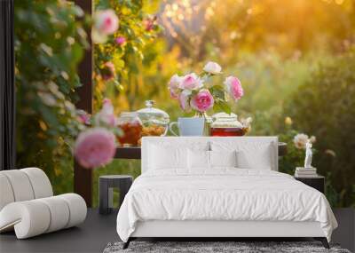 Jam in glass jar. Romantic dinner in the garden under a rose bush Pierre de Ronsard. Summer time Wall mural