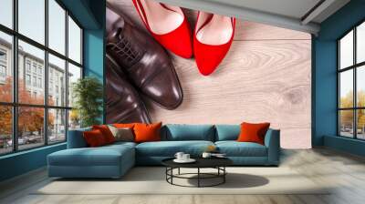 men's and red high heel womens shoes on white background Wall mural