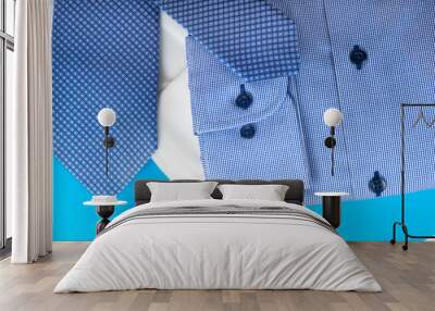 Stack of blue and white shirt closeup Wall mural