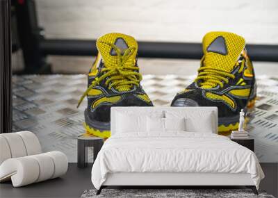 Unbranded modern sneaker in the gym. Black-Yellow. Comfortable shoes. Wall mural