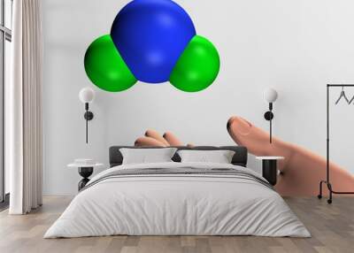 water molecule floatting over a human hand Wall mural