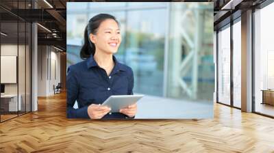 young asian business woman use digital tablet  Wall mural