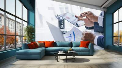 Using tablet pc, Consultant between bookkeepers and accounting lawyer consultation about asset, balance sheet, stock market statistics and yearly tax law, protect business from bribery. Wall mural