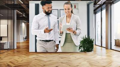 Business people, collaboration and teamwork with tablet in office for walking man and woman planning corporate strategy. Happy employees with smile, motivation or success vision on digital technology Wall mural