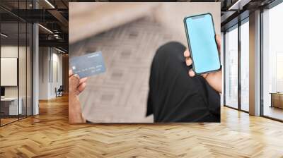 Hands, phone and credit card for online shopping with green screen for advertising or marketing. Blue screen, mobile and black man on 5g smartphone for payment, investment or internet banking mock up Wall mural