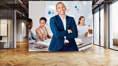 Leadership, success and teamwork, a businessman in a meeting in an office boardroom, with a smile. Diversity, collaboration and working together, proud team leader with support for staff and partners Wall mural