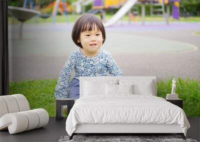 Baby girl play at outdoor playground Wall mural