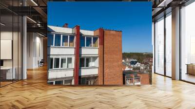 Modern Brick Apartment Building in Urban Setting Wall mural