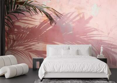 Palm tree shadow on a pink textured wall background, holiday concept wit palm tree leaves and a mediterranean pink textured wall, a tropical template with palm tree leaves and shadows and copy space Wall mural