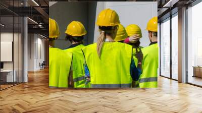 group of workers in hardhats. view from the back. Wall mural