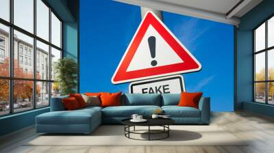 Fake News  - traffic sign with exclamation mark to alert, warn caution - precaution and warning of false information, hoax, disinformation, misleading misinformation, propaganda and manipulation  Wall mural