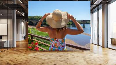 woman holiday maker looking at dordogne river Wall mural