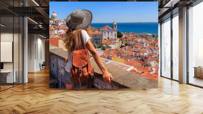 Woman tourist enjoying panoramic view of Lisbon city landscape- Portugal Wall mural