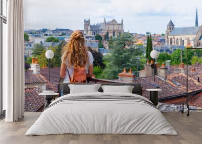 Woman tourist in Poitiers city landscape- France Wall mural