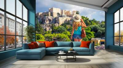 Woman tourist looking at Acropolis in Athens city- Greece Wall mural