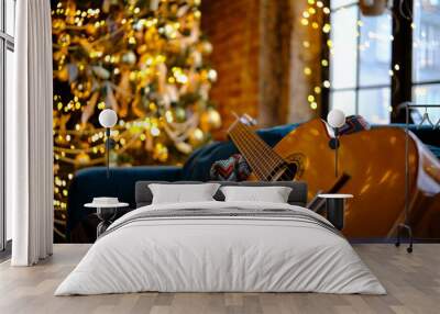 beautiful interior with decorated Christmas tree,  New YearWinter traditional Holidays, classical guitar on sofa Wall mural