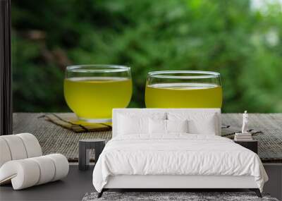 Cold Japanese green tea placed in a place with a view of the garden. Wall mural