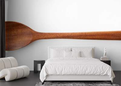 Wooden spoon placed on a white background Wall mural