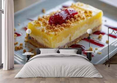 A photograph of a classic lemon bar with a ginger crumble topping, on an off-white rectangular plate. Wall mural