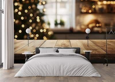 Empty wooden table top with blurred kitchen interior and Christmas tree in the background. 

 Wall mural