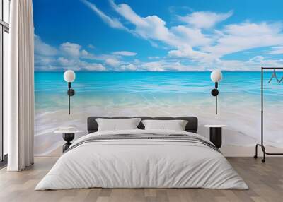 Sandy beach with light blue transparent water waves and sunlight, tranquil aerial beach scene Wall mural