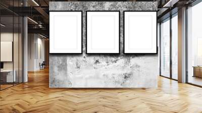 Close-up of three black picture frames on weathered concrete wall background Wall mural