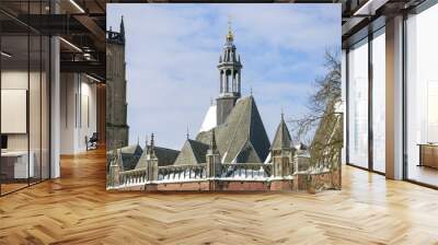 Closeup of church tower and rooftop with snow Wall mural