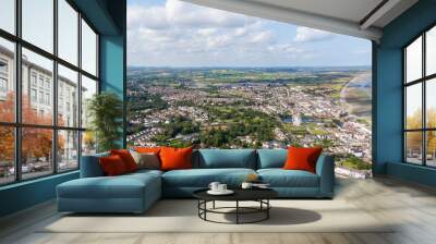 Aerial view on houses on coast of see in Newcastle, Northern Ireland. Coastal town, Drone photo Wall mural