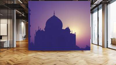 vintage retro toned silhouette of taj mahal at sunrise, india. Wall mural