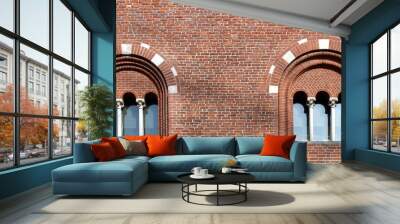 Two mullioned windows with three lights on a brick wall Wall mural