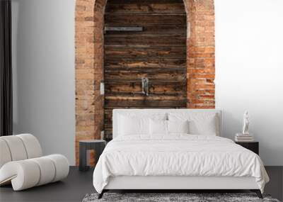 vintage wooden doors with classic brick pattern archway and wide marble stone stairs isolated on white Wall mural