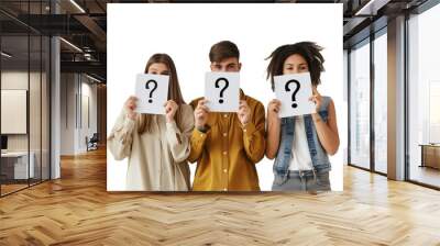 Three people holding white cards with question marks isolated on a transparent background Wall mural