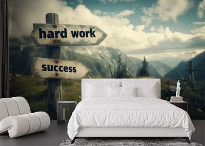 Arrow signs saying Hard work and Success pointing to a path in the mountains Wall mural