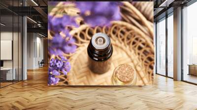 Lavender essential oil in a glass bottle Wall mural