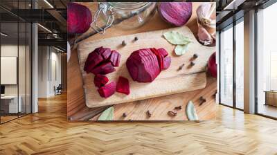 Sliced red beets with garlic and spices - ingredients to prepare beet kvass Wall mural