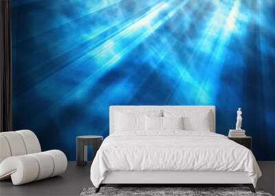 Abstract blue light rays background with glowing bokeh lights and lens flare, energy beams in the style of motion Wall mural