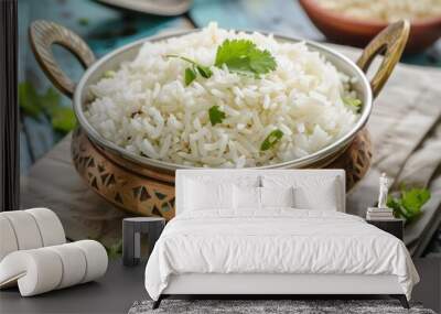 Bowl of rice with garlic and parsley on a wooden table Wall mural