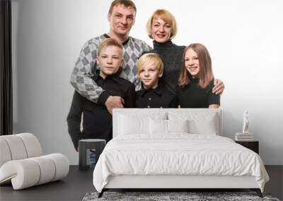 Happy adult large family of Slavic appearance in casual clothes, isolated on white background Wall mural