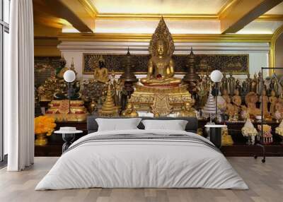 golden buddha statue in temple Wall mural